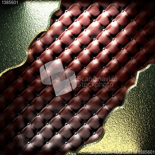 Image of golden plate on leather