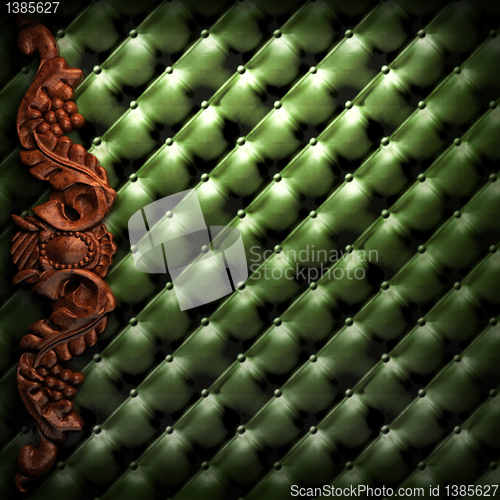 Image of red wood ornament on leather