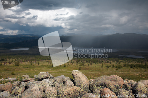 Image of Rain over high-mountain valley