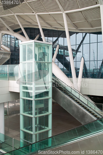 Image of Glass elevator and escalator