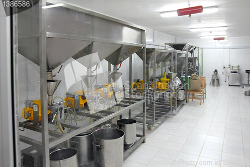 Image of extraction of oils in factory