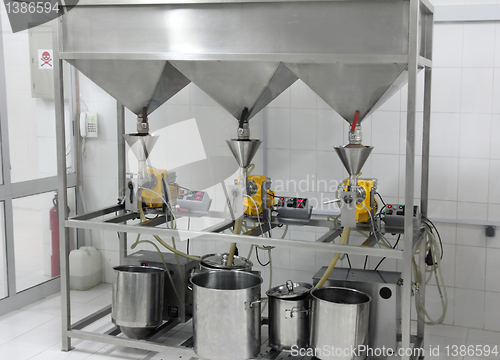 Image of extraction of oils in factory