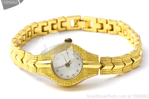 Image of Woman golden wrist watch 