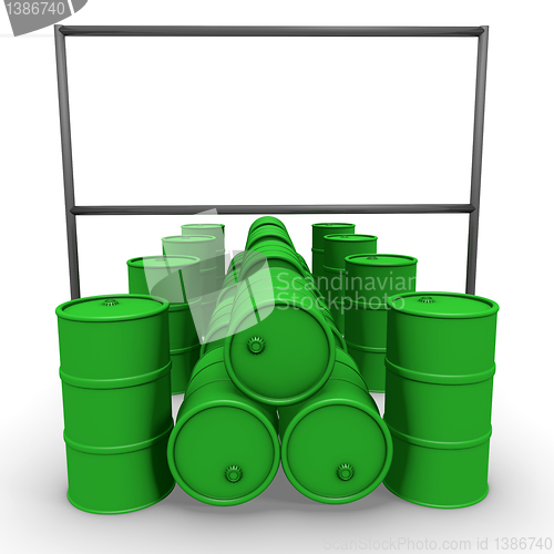 Image of Green barrels with blank billboard