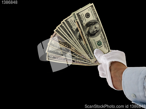 Image of hand giving money
