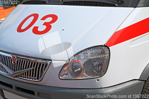 Image of car to ambulance on road