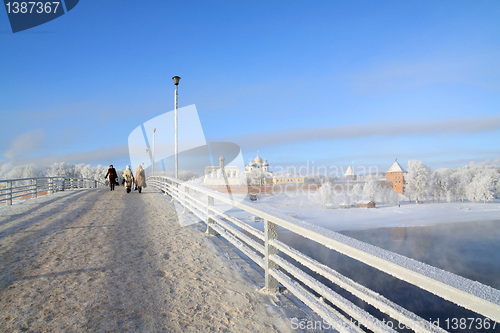 Image of town bridge on cool river