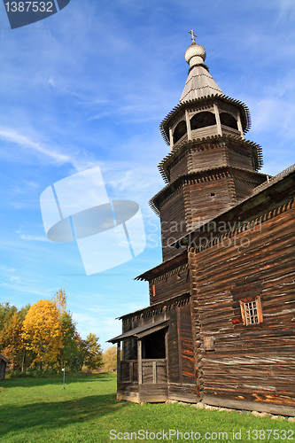 Image of aging wooden chapel in village 