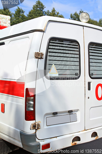 Image of car to ambulance on road