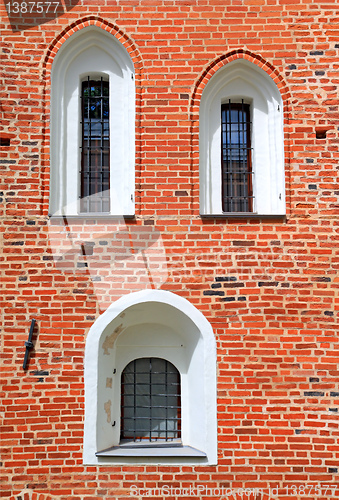 Image of window in red brick wall