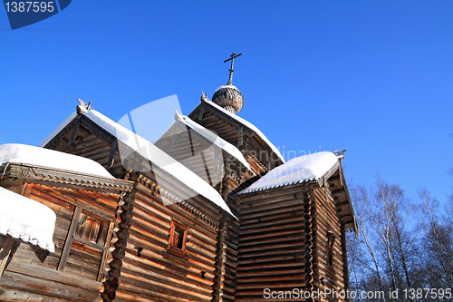 Image of wooden chapel on celestial background