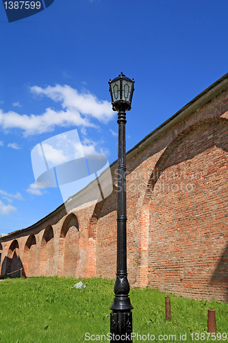 Image of old torch near fortress wall