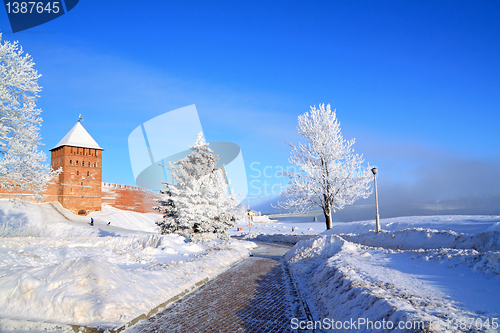 Image of snow road near old fortress