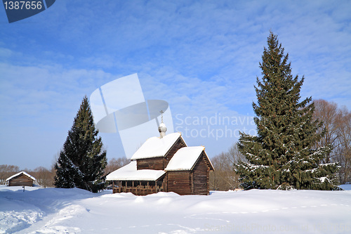 Image of wooden chapel in winter village