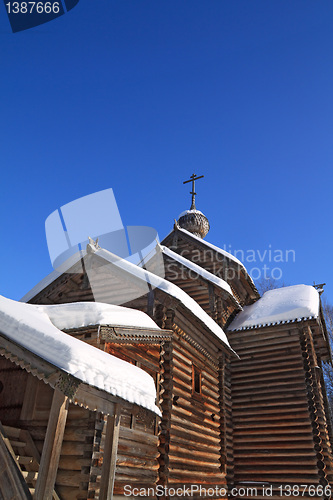 Image of wooden chapel on celestial background