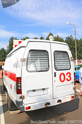 Image of car to ambulance on road