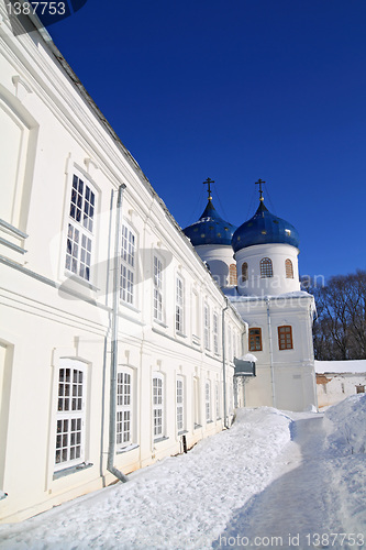 Image of christian orthodox male priory amongst snow