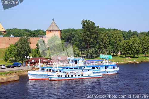 Image of two motorboats on town quay