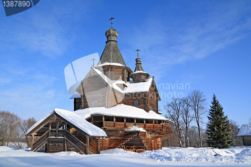 Image of wooden chapel in winter village