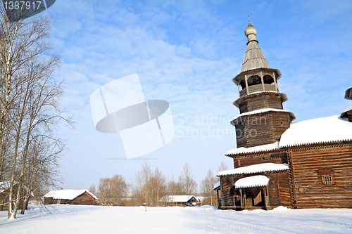 Image of wooden chapel in winter village