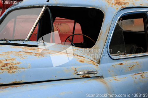 Image of Close-up Rusty Car Without Windows