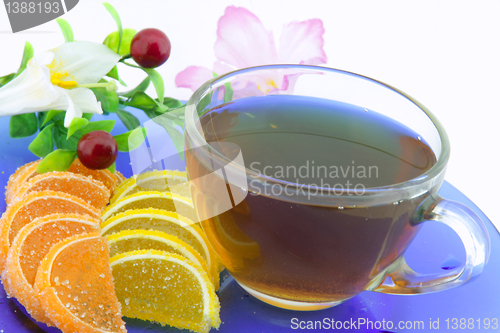 Image of tea, jujube and flower steel-life