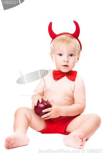 Image of kid in red suit of tempting devil 