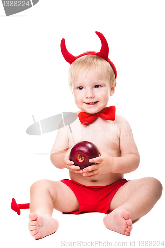 Image of kid in red suit of tempting devil 