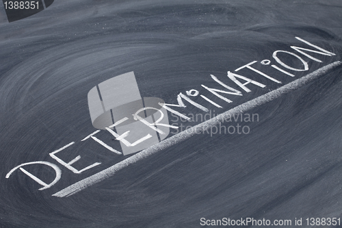 Image of determination word on blackboard