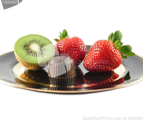 Image of kiwi ,strawberry and chocolate candy 