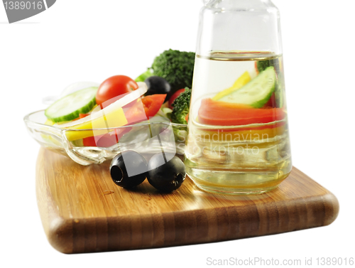 Image of salad and oil 