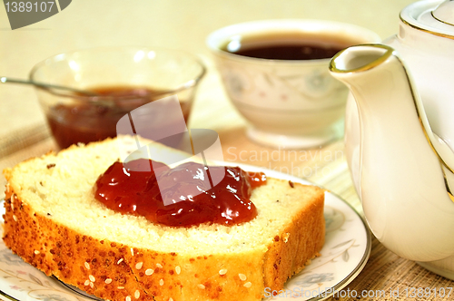 Image of tea and bread with jelly 