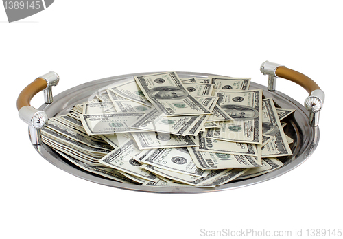 Image of tray with heap of dollars