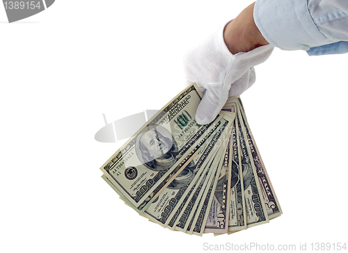 Image of hand holding money