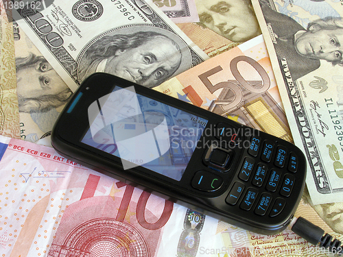 Image of mobile on money 