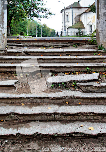 Image of aging stairway in destroyed building 