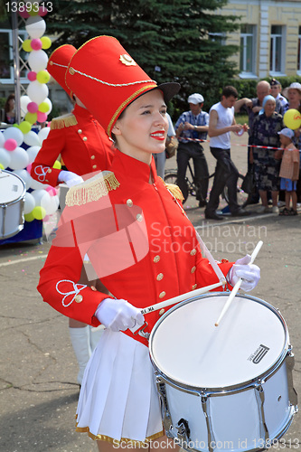 Image of Staraya Russa, Russia - July 9: Young drummer girl at the parade