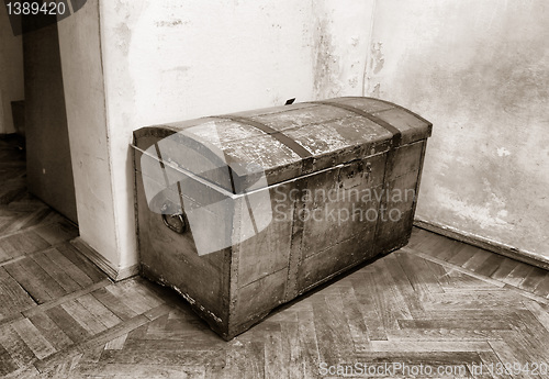 Image of old coffer on dirty floor