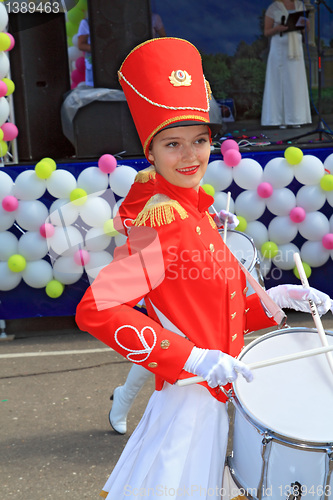 Image of Staraya Russa, Russia - July 9: Young drummer girl at the parade