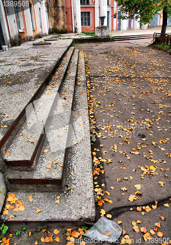 Image of yellow sheet on old stairway