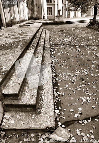 Image of yellow sheet on old stairway