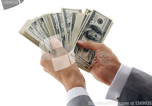 Image of businessman calculating money