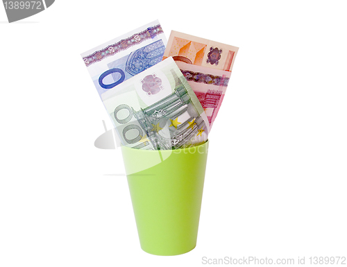 Image of money in a cup