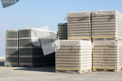 Image of Pallets of empty glass jars