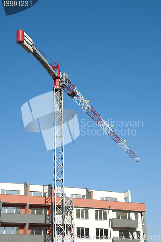 Image of New colored building and crane