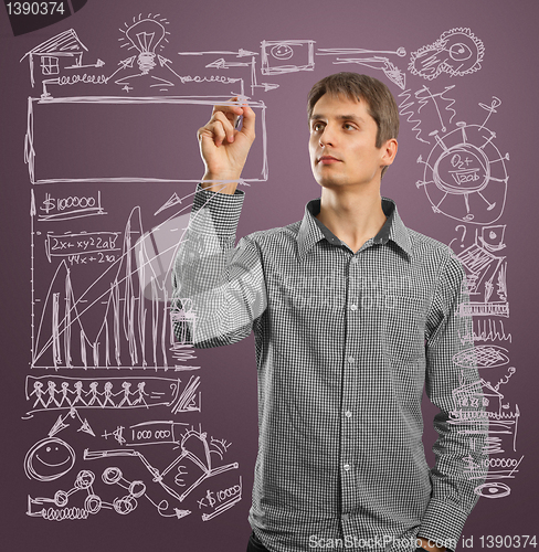 Image of businessman writing something