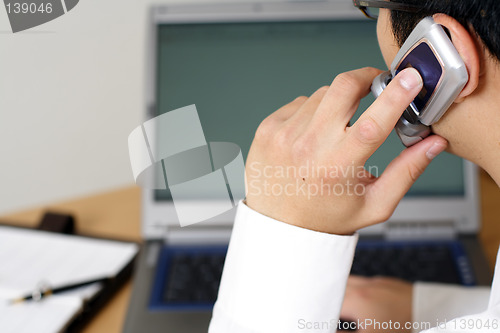 Image of Working businessman