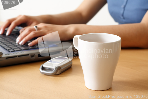Image of Working businesswoman