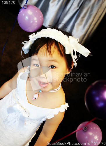 Image of Party girl with balloons