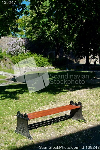 Image of A bench in a park